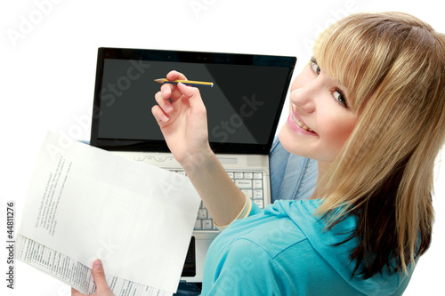 Photo: A young college girl studying, back-view A young college girl studying, back-view