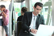 young man in public transportation