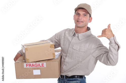 Photo: Man delivering parcels Man delivering parcels
