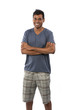 Photo: Happy Indian man wearing shorts & t-shirt with his arms crossed. Happy Indian man wearing shorts & t-shirt with his arms crossed.