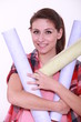 Woman charged with rolls of wallpaper