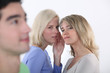 Girls criticizing boy