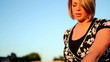Woman Visits Grave in Cemetery