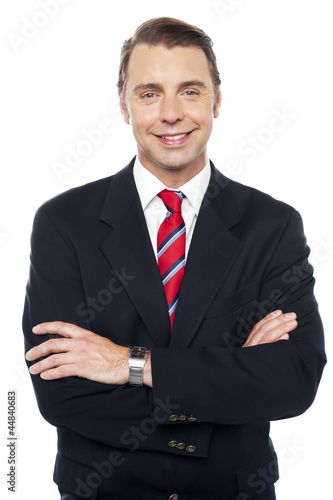 Photo: Arms crossed portrait of caucasian businessman Arms crossed portrait of caucasian businessman