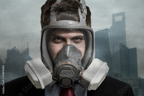 Photo: Businessman in a polluted city Businessman in a polluted city