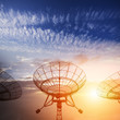 satellite dishes with sunset