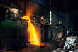 Pouring of liquid metal in open hearth workshop