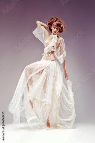 Photo: Romantic woman, white vintage dress, retro style, renaissance Romantic woman, white vintage dress, retro style, renaissance