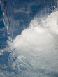 Close up of water splashing into swimming pool