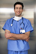 Portrait of smiling doctor with arms crossed
