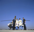Portrait of doctors and paramedics outside emergency airlift helicopter
