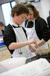 Students cooking in home economics class