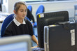 Girl using computer in computer lab