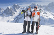 Foto: Smiling senior men with skis on snowy mountain Smiling senior men with skis on snowy mountain