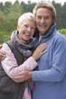 Portrait of smiling senior couple hugging