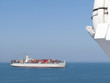 Container ship on ocean loaded with freight containers