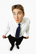 Photo: Businessman holding out empty pockets Businessman holding out empty pockets