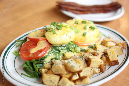 Photo: Delicious eggs florentine for breakfast at a restaurant. Delicious eggs florentine for breakfast at a restaurant.