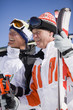 Smiling skiers standing together