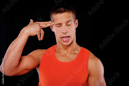 Photo: A young man is tired of posing A young man is tired of posing