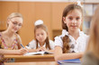 Photo: Little girl at school class Little girl at school class