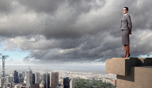 Photo: Businesswoman and cityscape Businesswoman and cityscape
