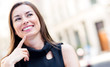 Happy woman thinking
