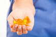 Nurse holding an handful of pills