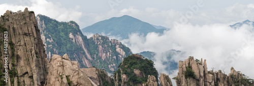Photo: Image of Huangshan (yellow mountain) and pine tree on the top Image of Huangshan (yellow mountain) and pine tree on the top