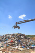 Grabber crane working in landfill