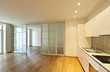 interior empty house with wooden floor, kitchen