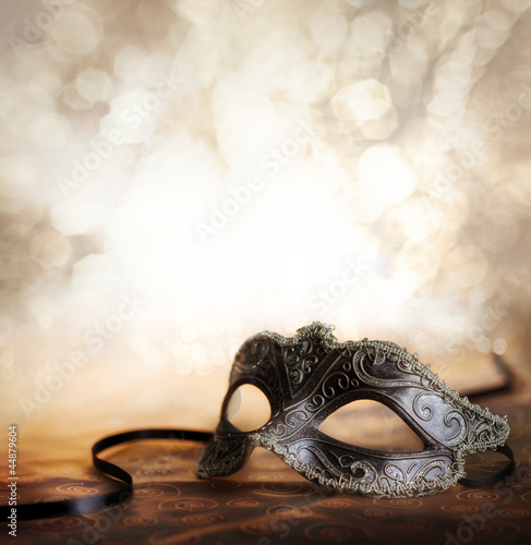 Photo: carnival mask with glittering background carnival mask with glittering background