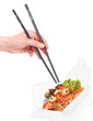 Chinese food  with hand and chopsticks