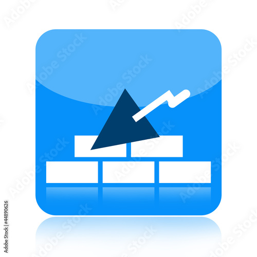 Illustration: Trowel and brick wall icon Trowel and brick wall icon