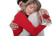 Woman thanking her boyfriend for his gift