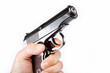 Gun in hand on a white background.