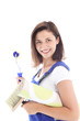 Attractive confident woman decorator with wallpaper