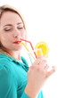 Photo: Blissful woman in a turquoise top drinking cocktail Blissful woman in a turquoise top drinking cocktail