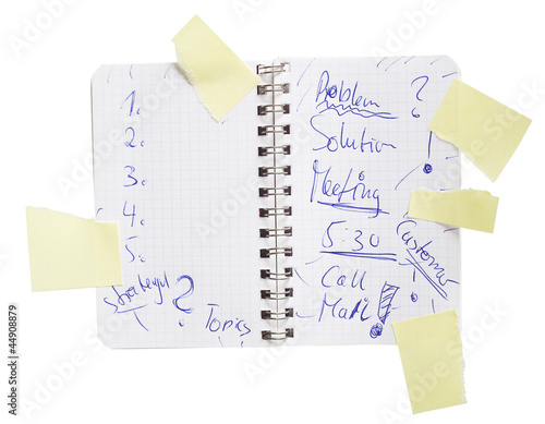 Photo: notebook with notes, free copy space, knocked out notebook with notes, free copy space, knocked out