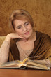 Beautiful Caucasian aged woman sitting
