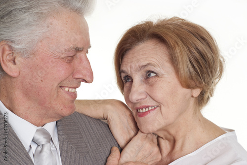 Photo: An senior with a woman standing An senior with a woman standing