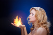 Frozen girl hold a falme in palms