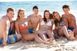 Group Of Teenage Friends Enjoying Beach Holiday Together