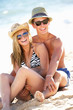 Teenage Couple Enjoying Beach Holiday Together