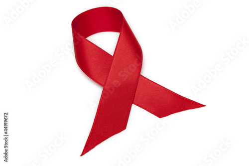 Photo: Red ribbon isolated on white background Red ribbon isolated on white background