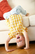 Photo: Young Boy Relaxing On Sofa At Home Young Boy Relaxing On Sofa At Home