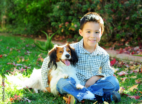 Photo: A Young Boy and a Dog A Young Boy and a Dog