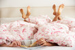 Photo: Couple's Hands Reaching From Under Duvet For Breakfast Couple's Hands Reaching From Under Duvet For Breakfast