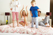 Photo: Family Relaxing Together In Bed Family Relaxing Together In Bed