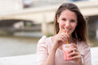 Woman having a smoothie